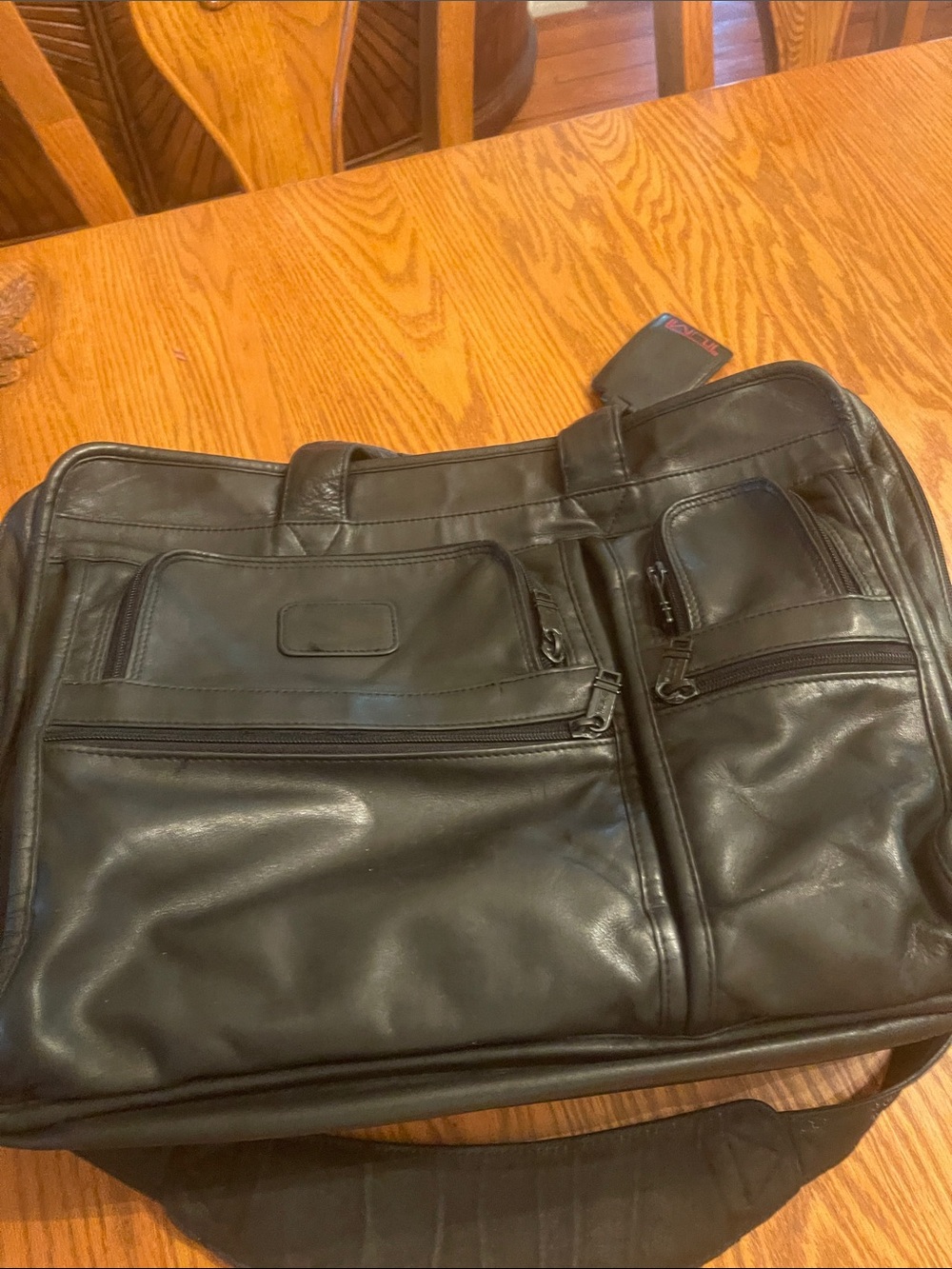 Tumi Black Leather Men's Briefcase with Front Zip Pockets